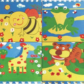 Colorful animal foam play mat featuring a bee, frog, giraffe, and tiger against a sunny background